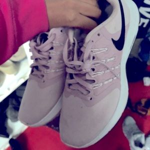 Pink Nike running sneakers